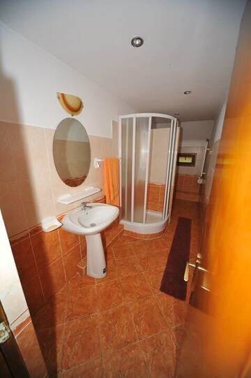 Фото номера Коттедж с 6 спальнями Дома для отпуска Cabana Sebes г. Фэгэраш 11