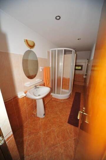 Фото номера Коттедж с 6 спальнями Дома для отпуска Cabana Sebes г. Фэгэраш 23