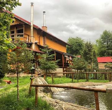 Фото номера Коттедж с 6 спальнями Дома для отпуска Cabana Sebes г. Фэгэраш 32
